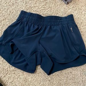 Lululemon 4 in inseam tracker running shorts color: navy size 10